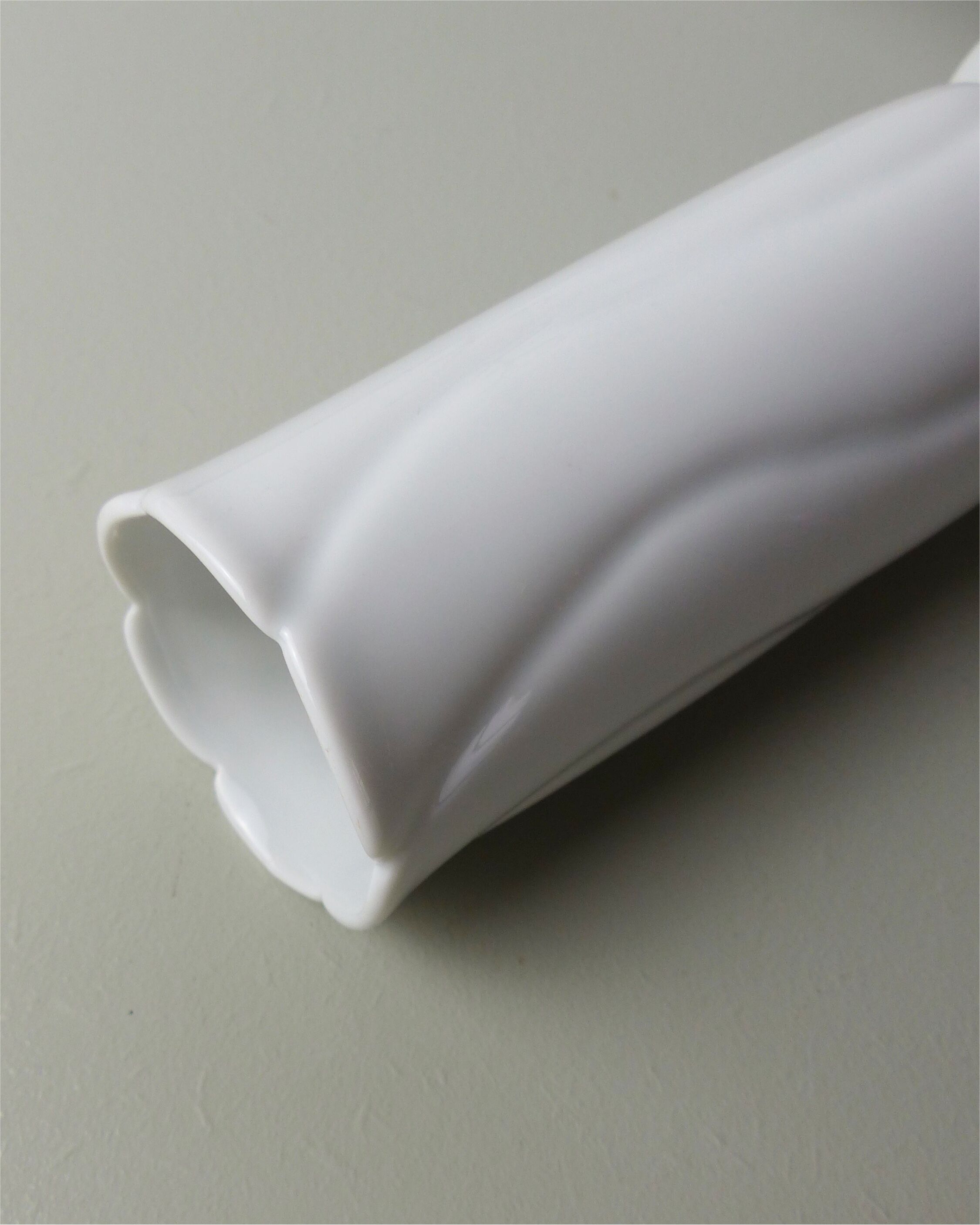 White porcelain tube vase