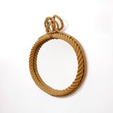 Large oval mirror in rope with pediment, 64cm x 56.5cm.