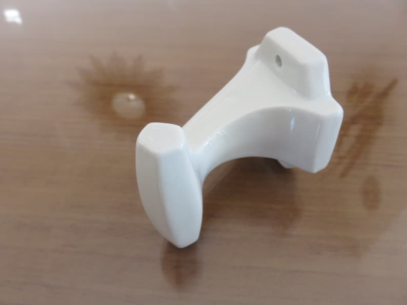 Old coat hook in white porcelain art deco years 30 40