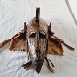 African mask from Mali from the N'Tomo tribe of Marka covered in chiseled brass
