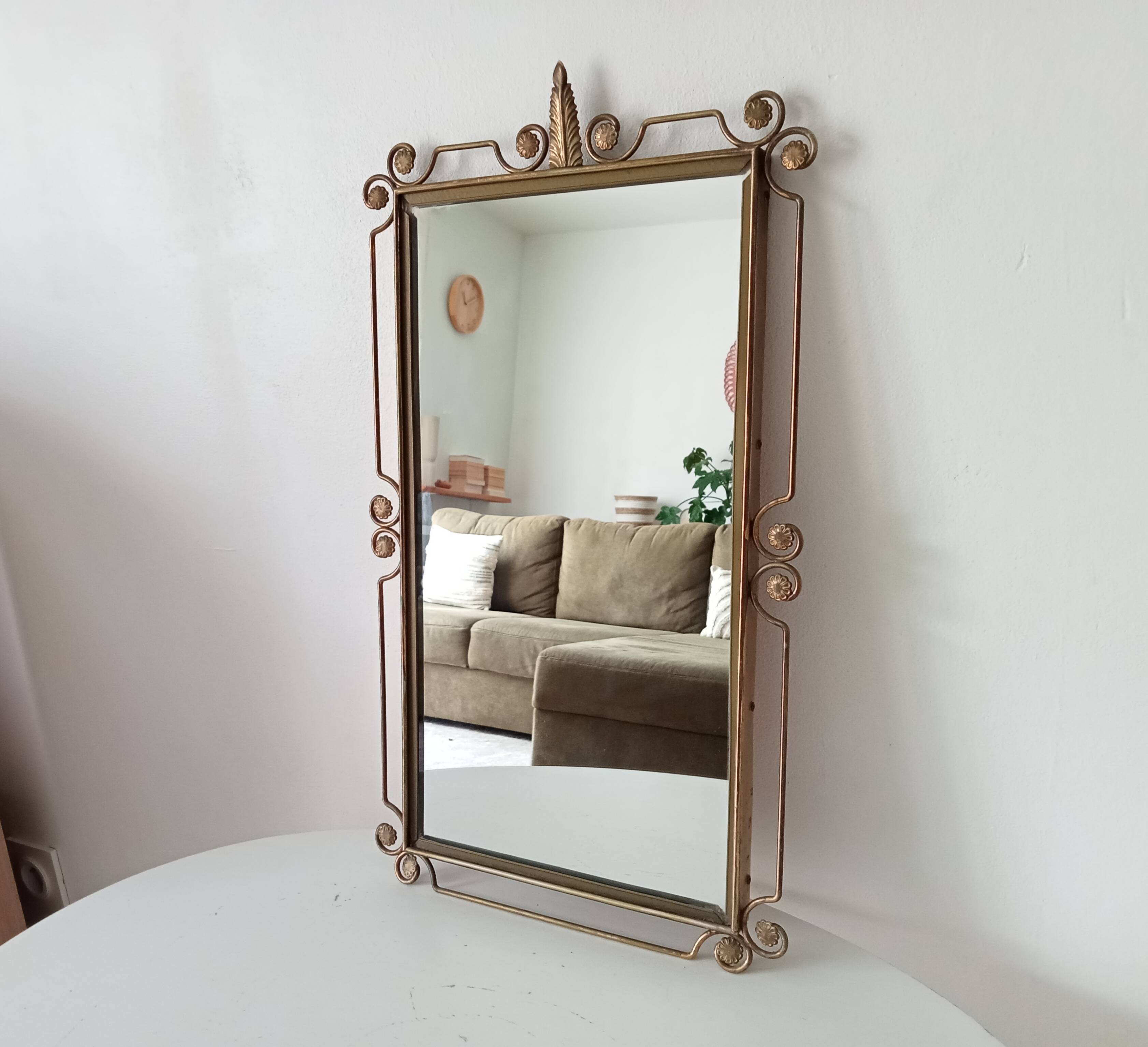 Vintage Hollywood Regency mirror from the 1950s.