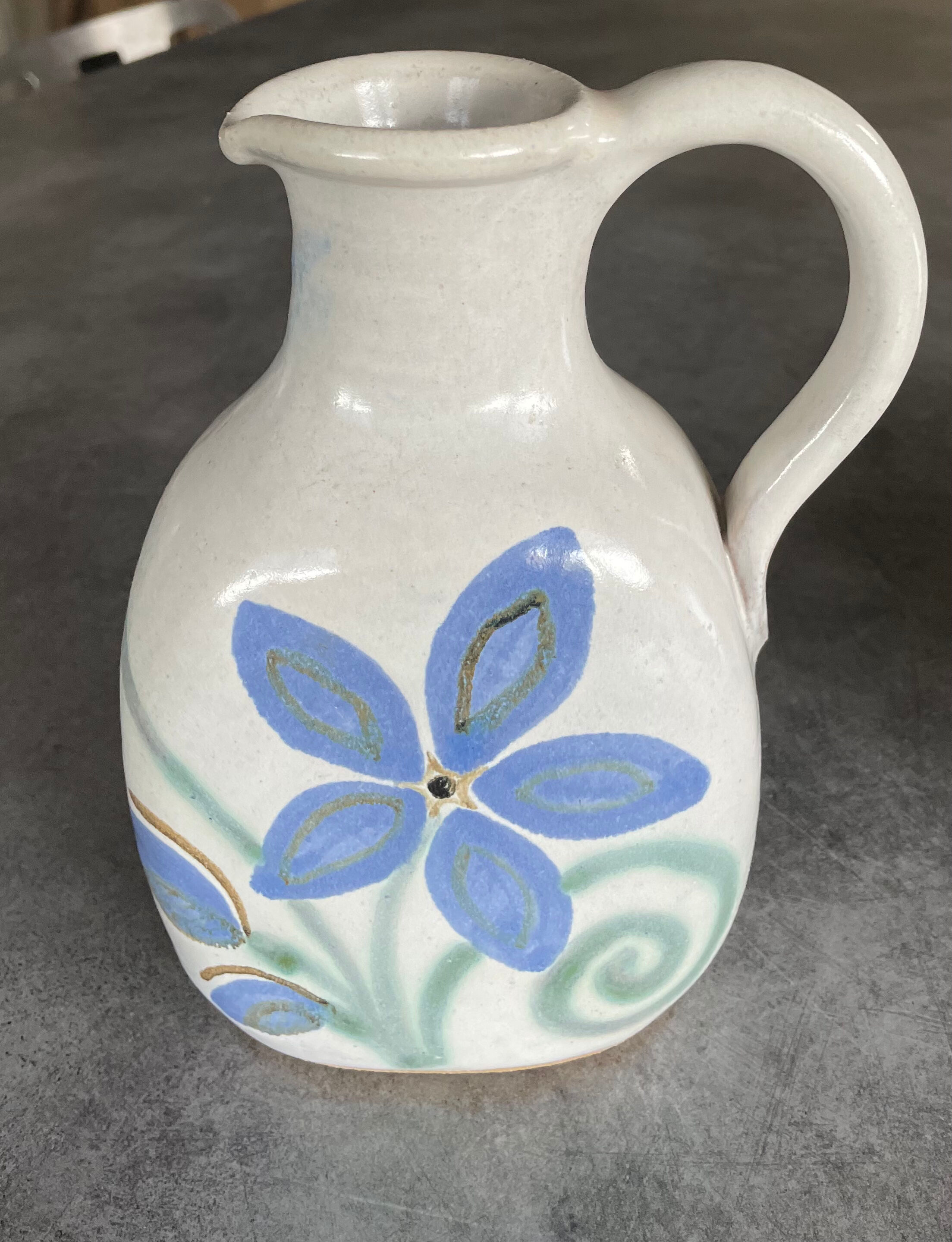 Vintage signed stoneware pitcher jug with floral painting decoration
