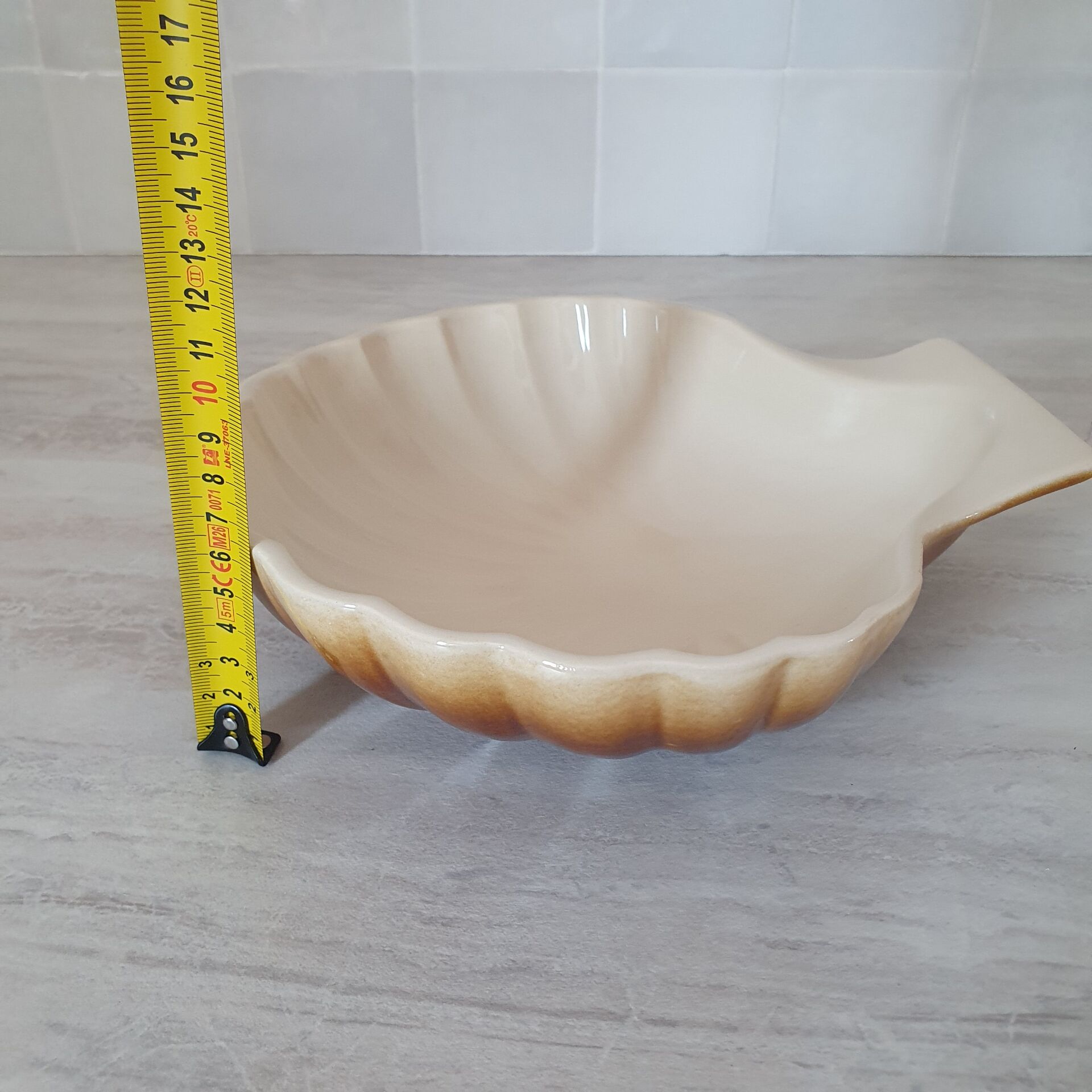 Brown and white ceramic shell bowl
