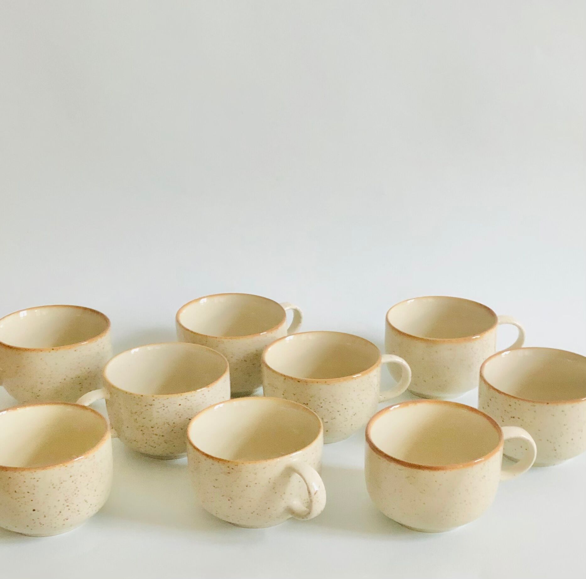 Set of 9 speckled ceramic coffee cups