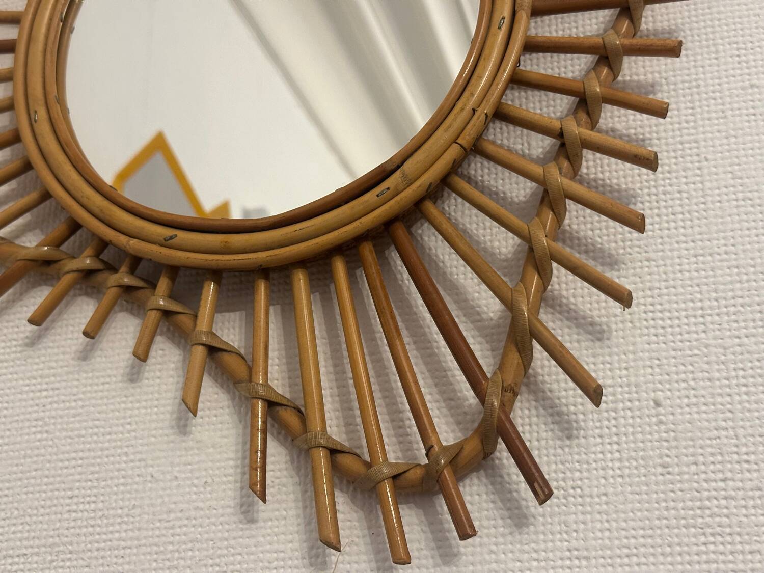 The vintage guitar rattan mirror.