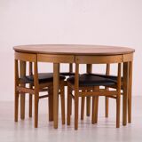 Table and 4 scandinavian encastrable chairs