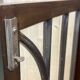 English Chippendale walnut display cabinet from the 1930s