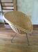 Antique round rattan armchair