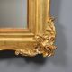Antique carved and gilded wooden mirror, Italy, late 19th century.