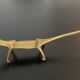 8 porte-couteaux forme antilope et crocodile en laiton