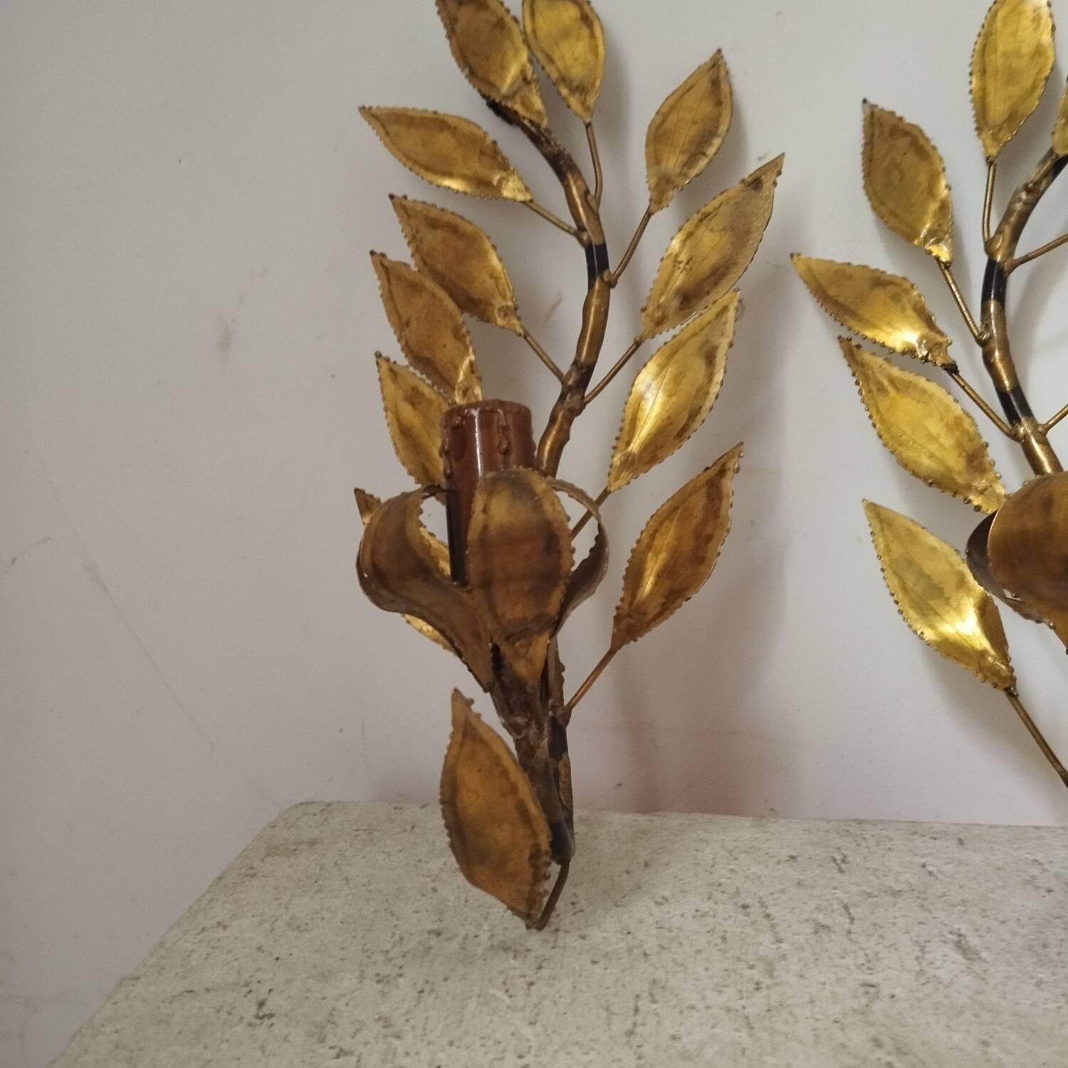 Pair of gold metal floral leaf sconces