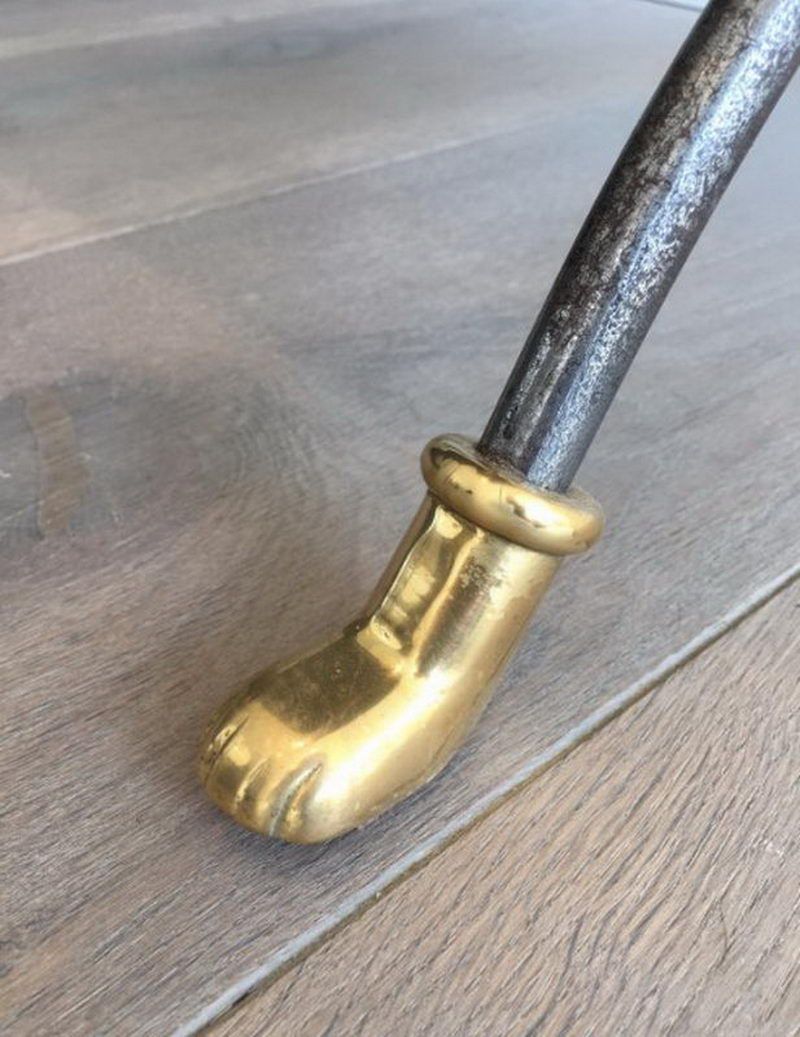 Coffee table in brushed steel and brass