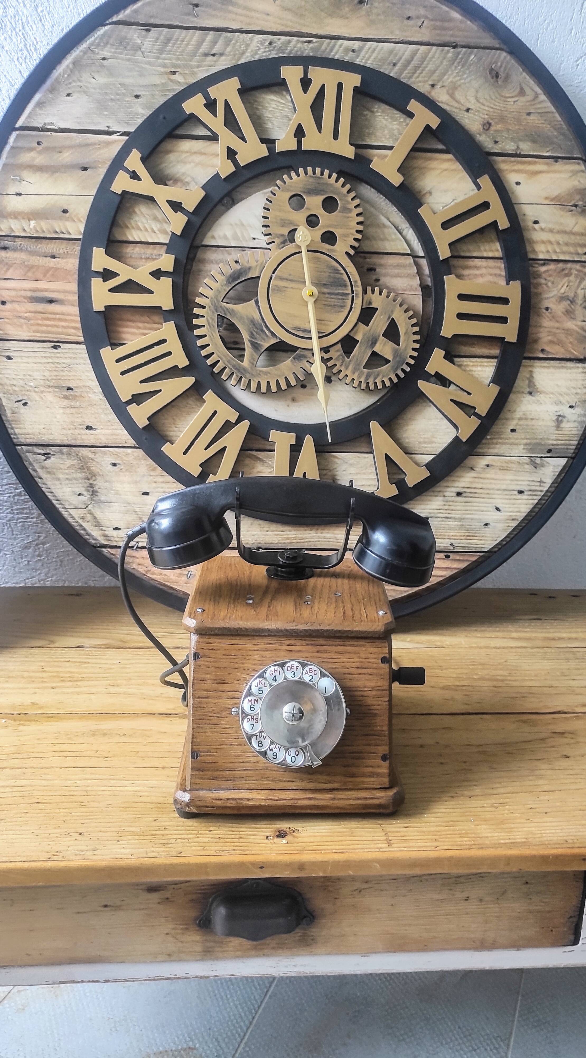 Old wooden dial crank telephone