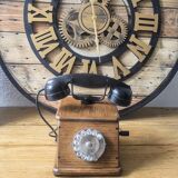 Old wooden dial crank telephone