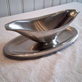 Very beautiful sauce boat from Létang Remi in very good condition.