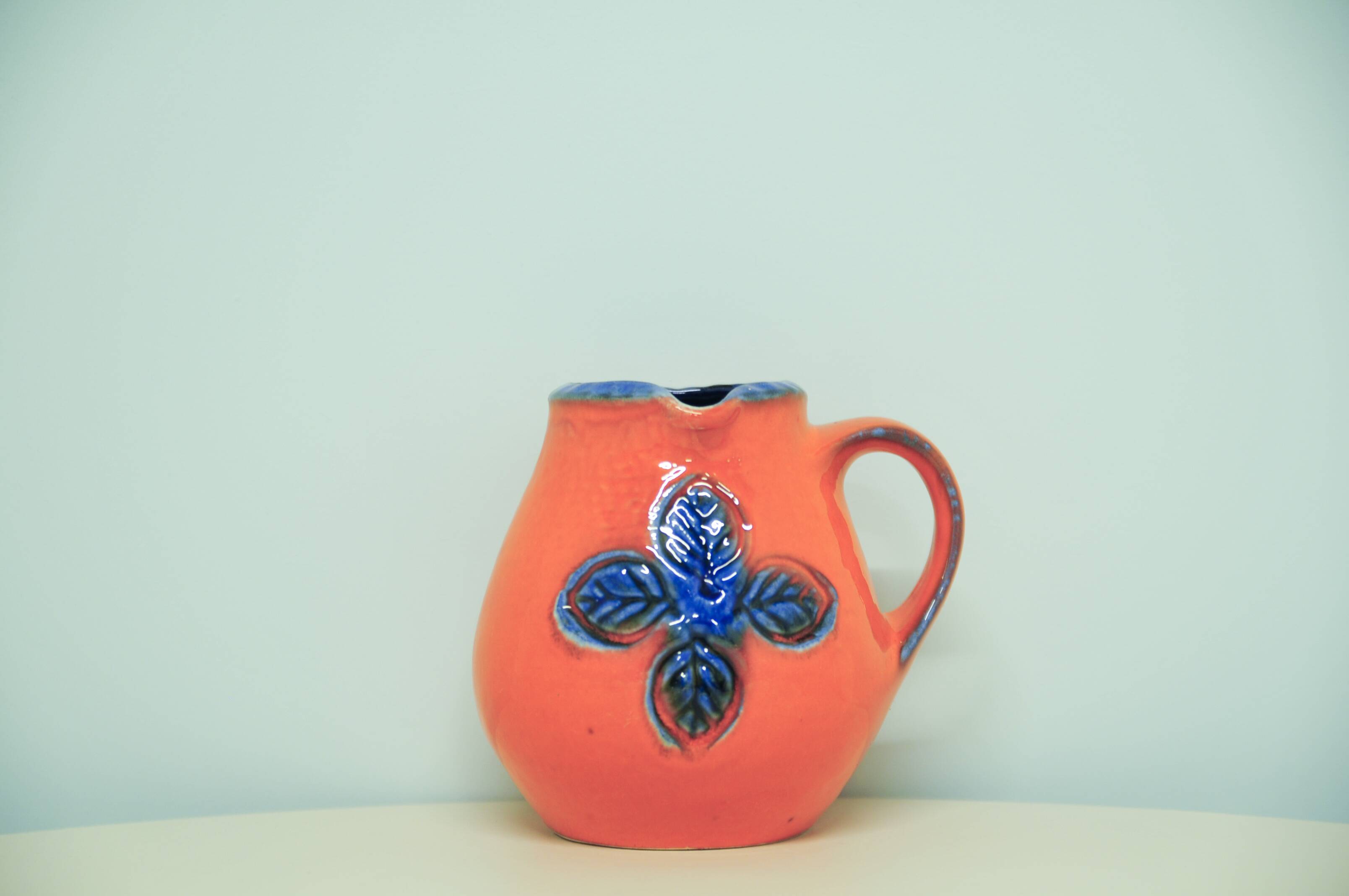 Vintage orange and blue flower west germany jug carstens