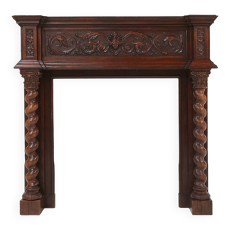 Richly decorated antique fireplace in oak, Belgium ca. 1920