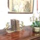 Pair of vintage brass bookbands