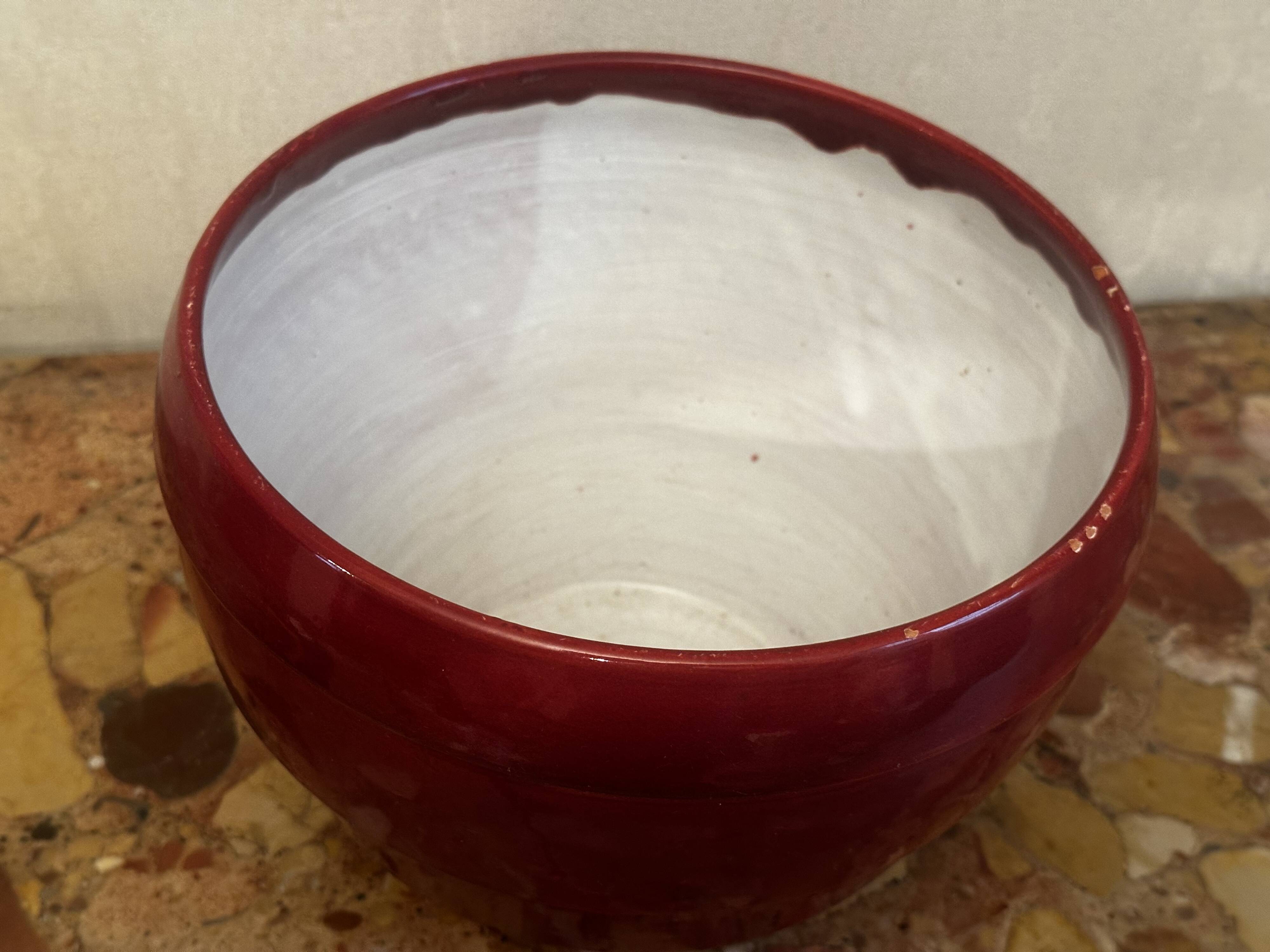 Burgundy glazed ceramic planter