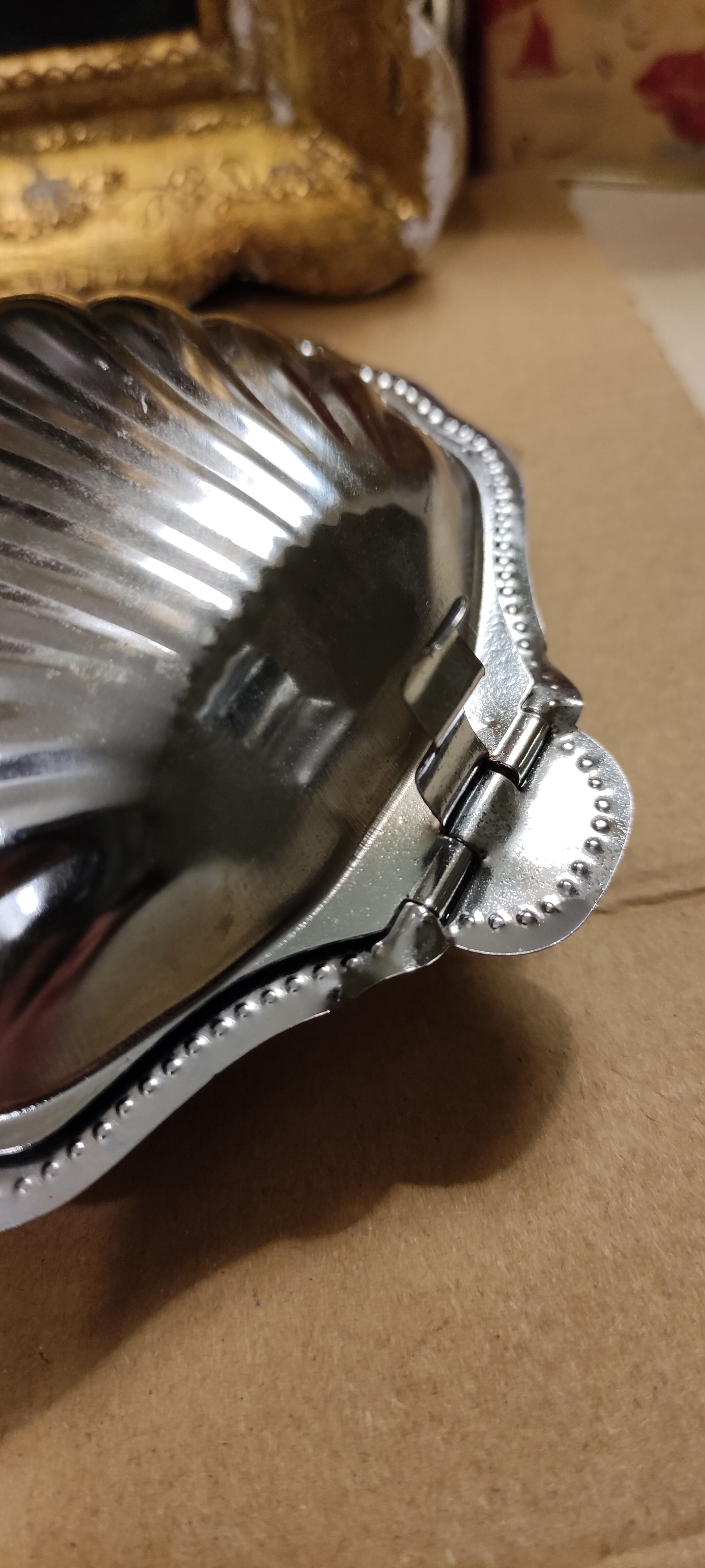 Vintage silver metal butter in shell shape
