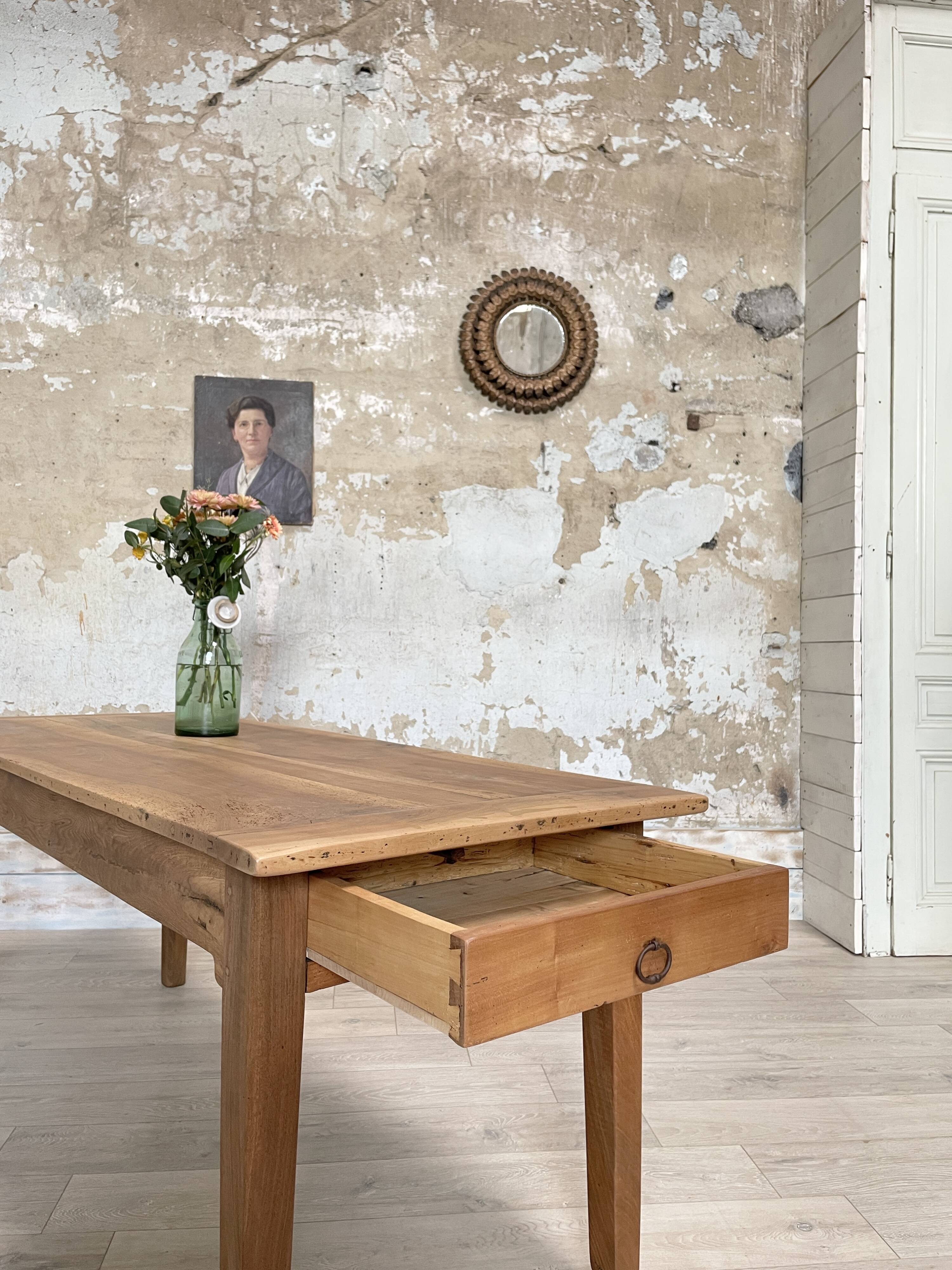Vintage farmhouse table with spindle legs.