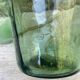 set of tinted glass demijohns