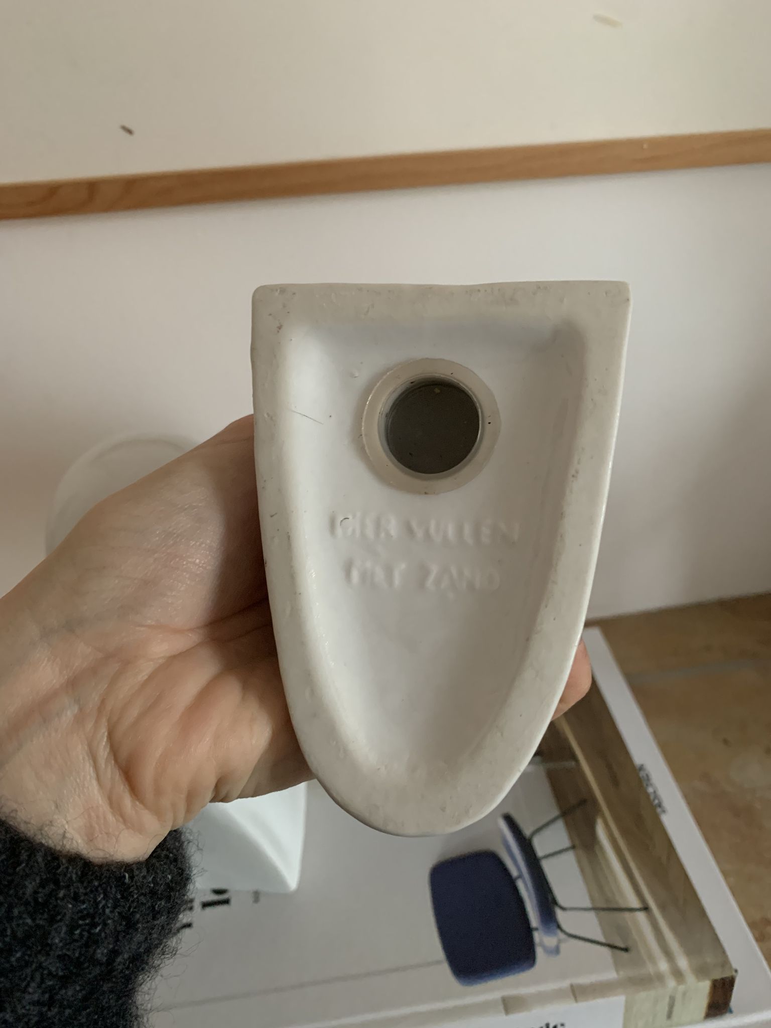 Vintage bookends in the shape of a goose or ceramic duck