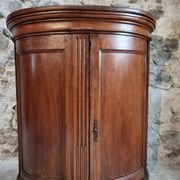 Antique demi-lune cabinet in walnut, late 18th century, French château.