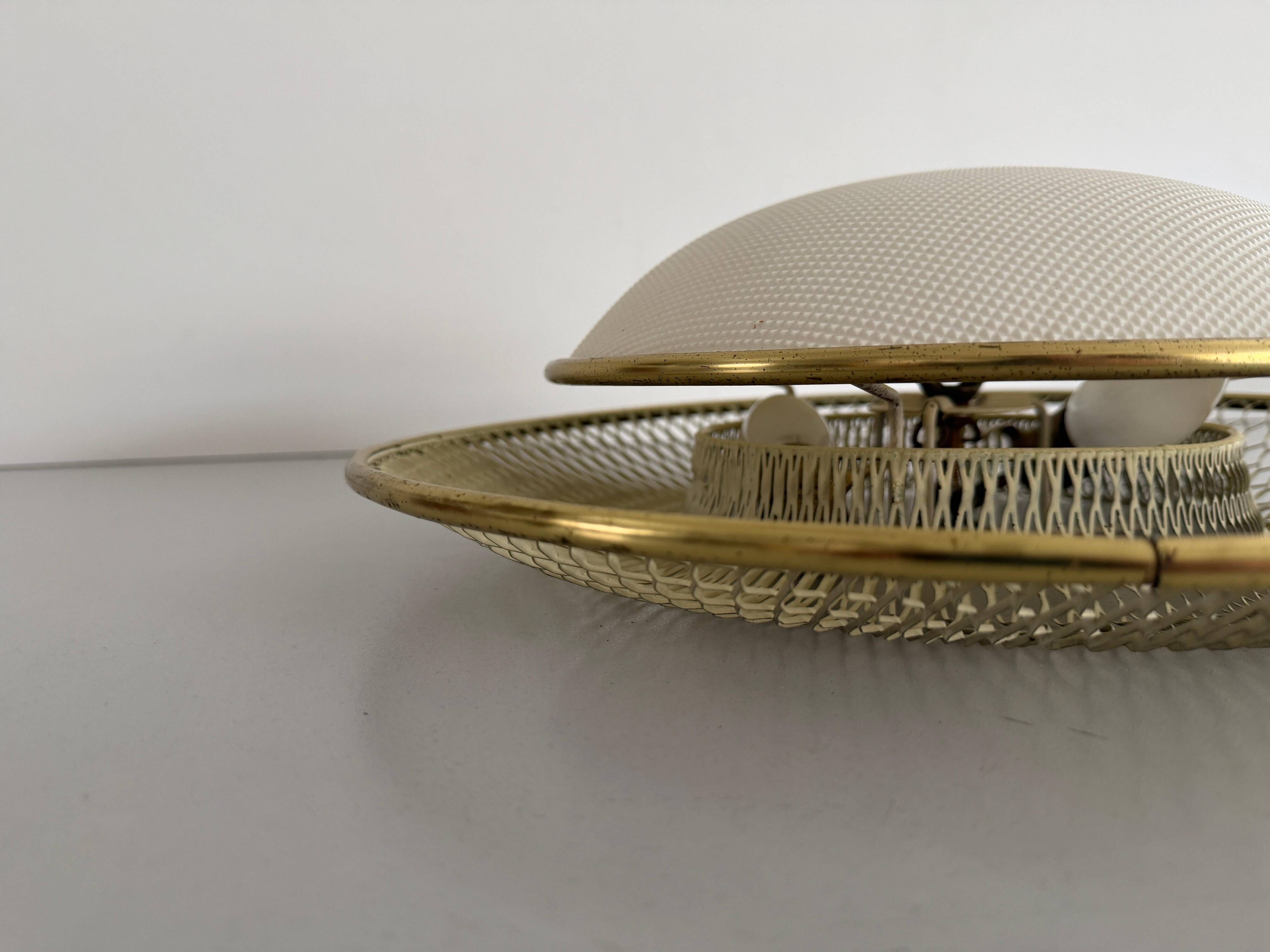 Mid-century golden metal wire and plastic ceiling light by Erco, 1950s, Germany.