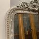 Louis XV style mirror in wood and patinated stucco 19th century
