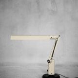 Beige plastic table lamp Lucifer, mid-century modern Scandinavian style.