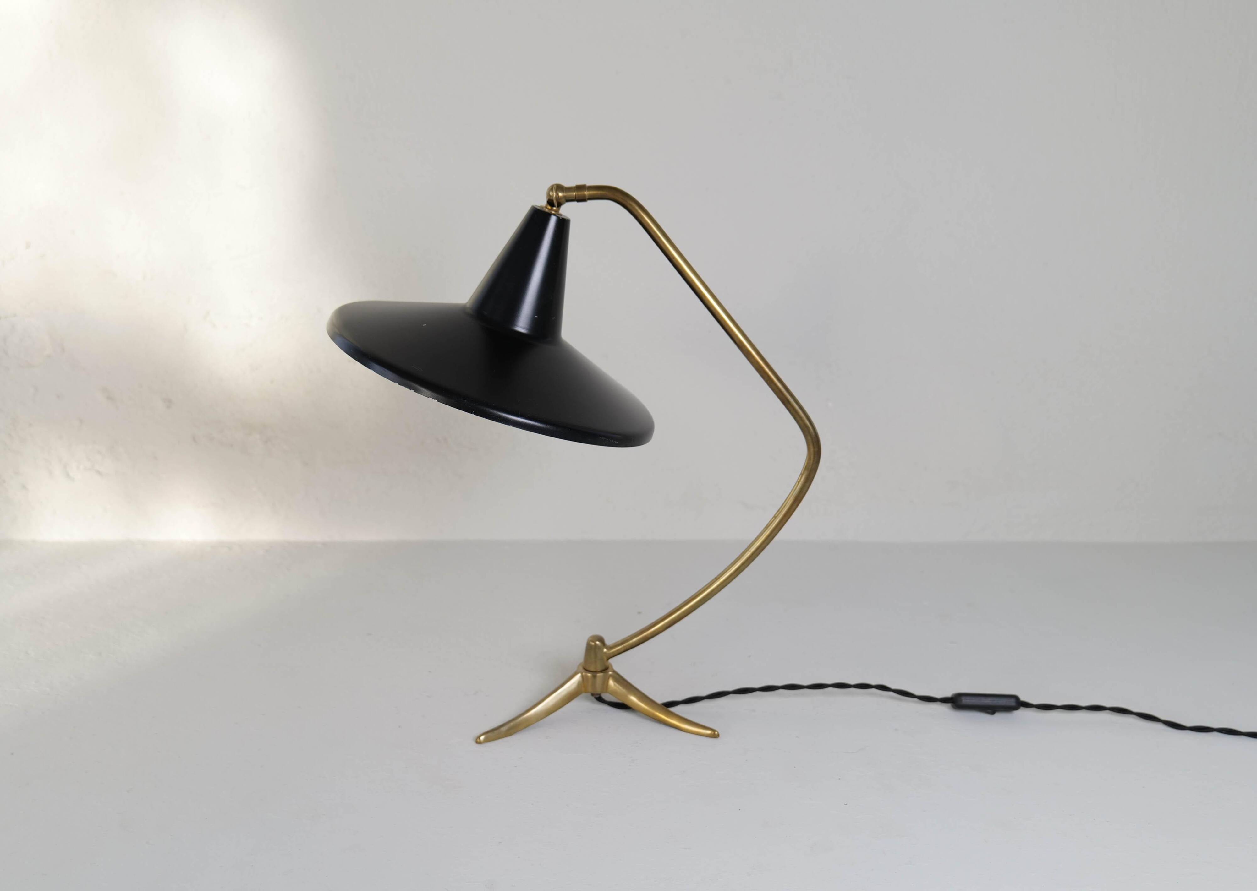Brass table lamp on a tripod in modern Swedish style, Sweden, 1950.