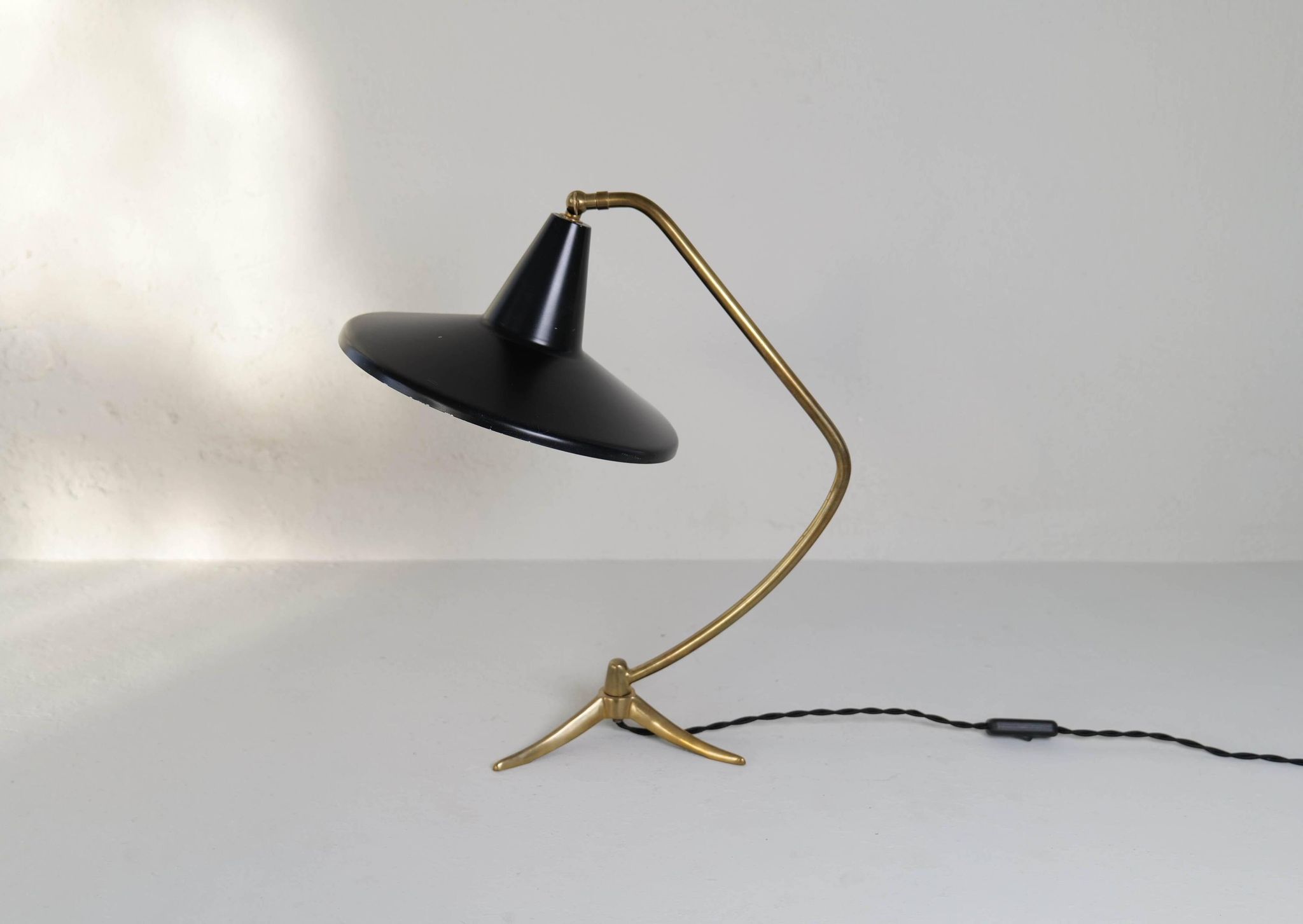Brass table lamp on a tripod in modern Swedish style, Sweden, 1950.