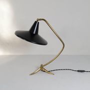 Brass table lamp on a tripod in modern Swedish style, Sweden, 1950.