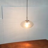 Suspended UFO-shaped glass luminaires in mid-century German Space Age style, set of 3.