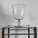 Large Médicis vase in transparent glass on a baluster base.