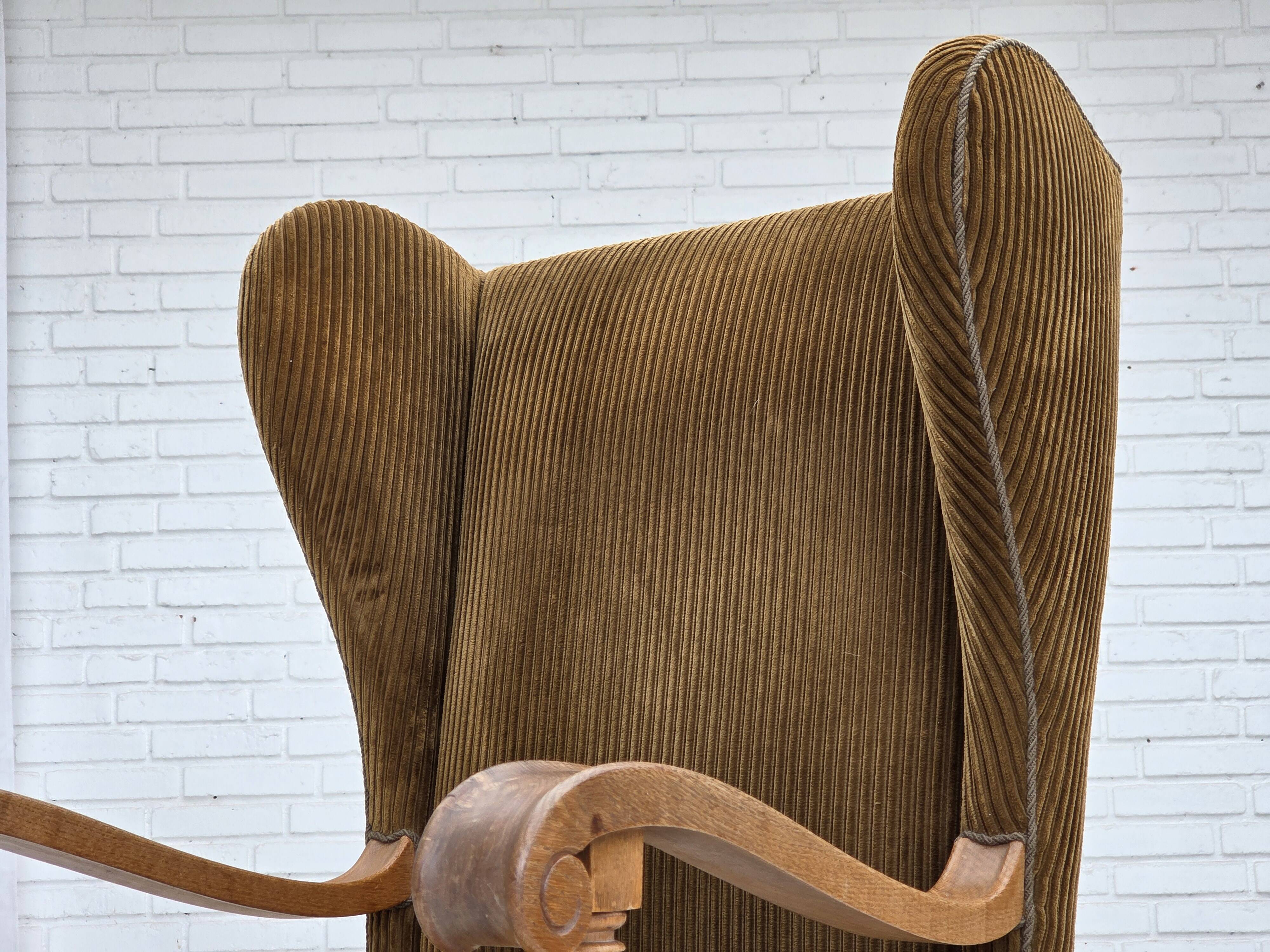 1970s, Scandinavian highback armchair, furniture corduroy, carved oak wood.