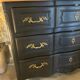 Black and wood chest of drawers
