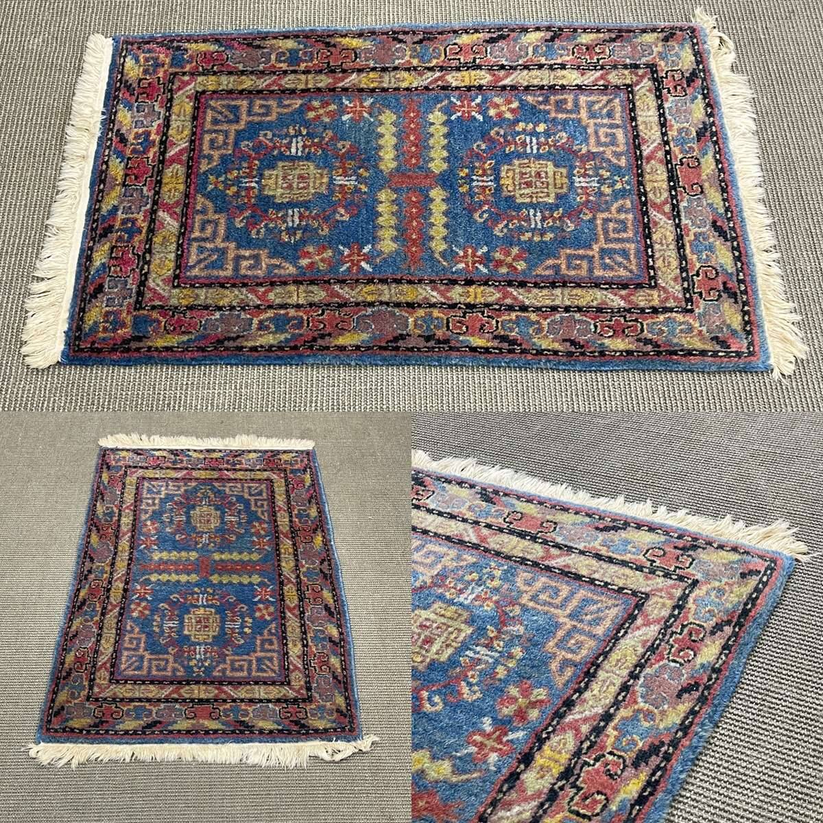 Small handmade wool Iranian rug.