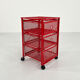 Chest of drawers on red metal wheels, 1980