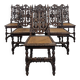 Set of 6 Henri II chairs in carved openwork oak with caned seats.