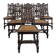 Set of 6 Henri II chairs in carved openwork oak with caned seats.