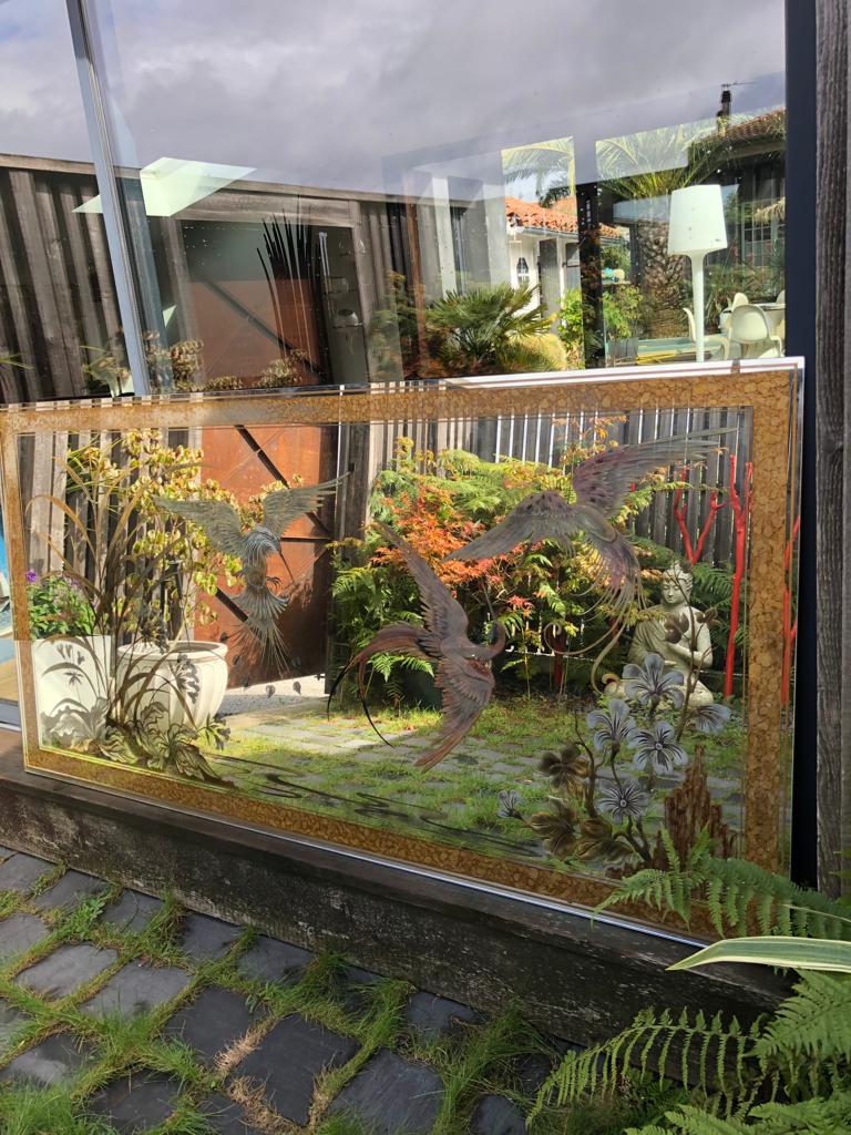 Mirror decorated with birds
