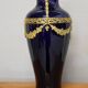 Vase signed Legastelois in blue ceramic of Sèvres and gilded bronze