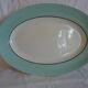 Moulin des loups oval serving dish, white with celadon-colored edges