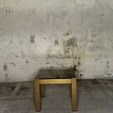 Trio of nesting tables, brass structures and smoked mirror tops