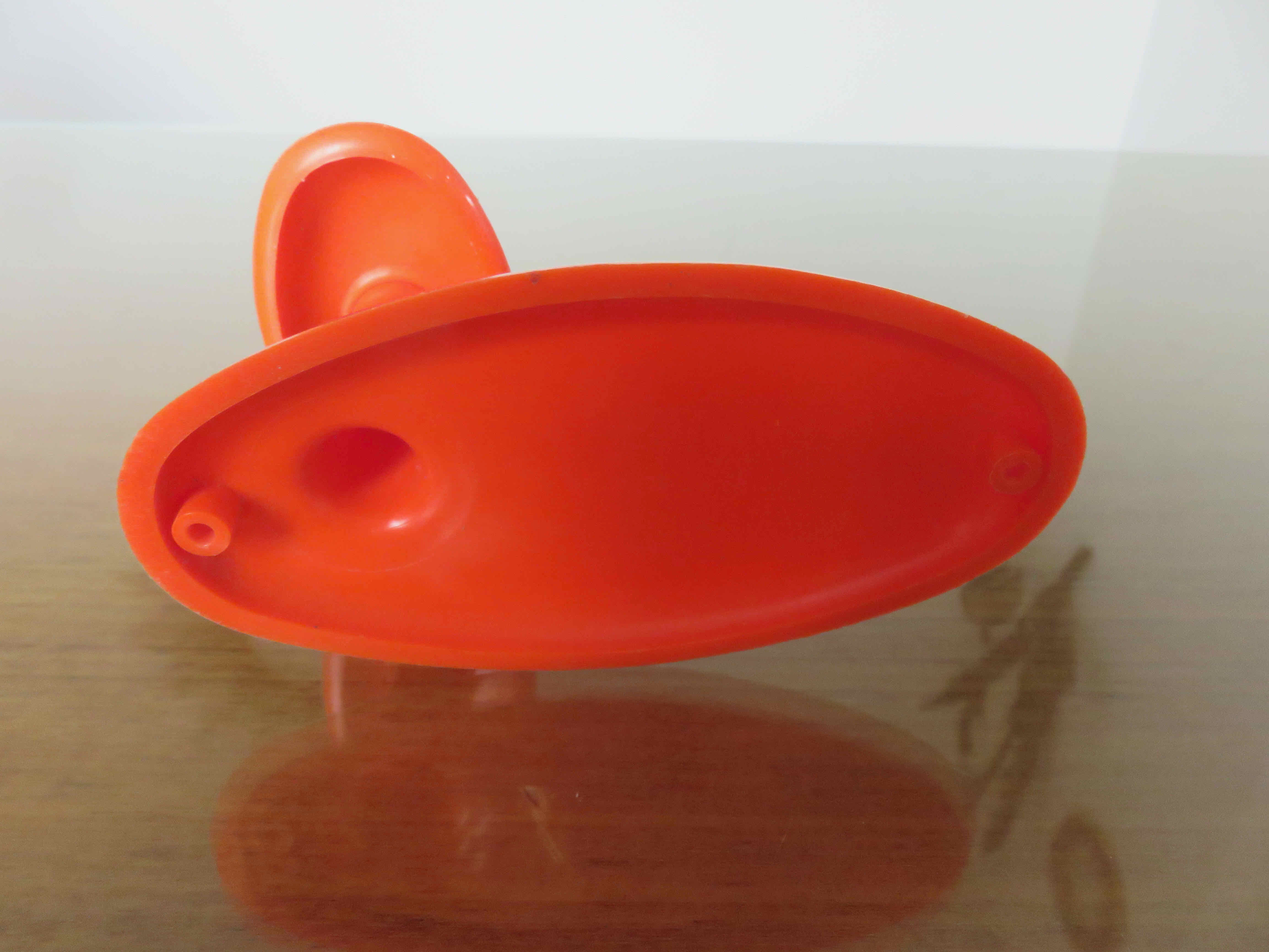 Orange plastic hook 70s