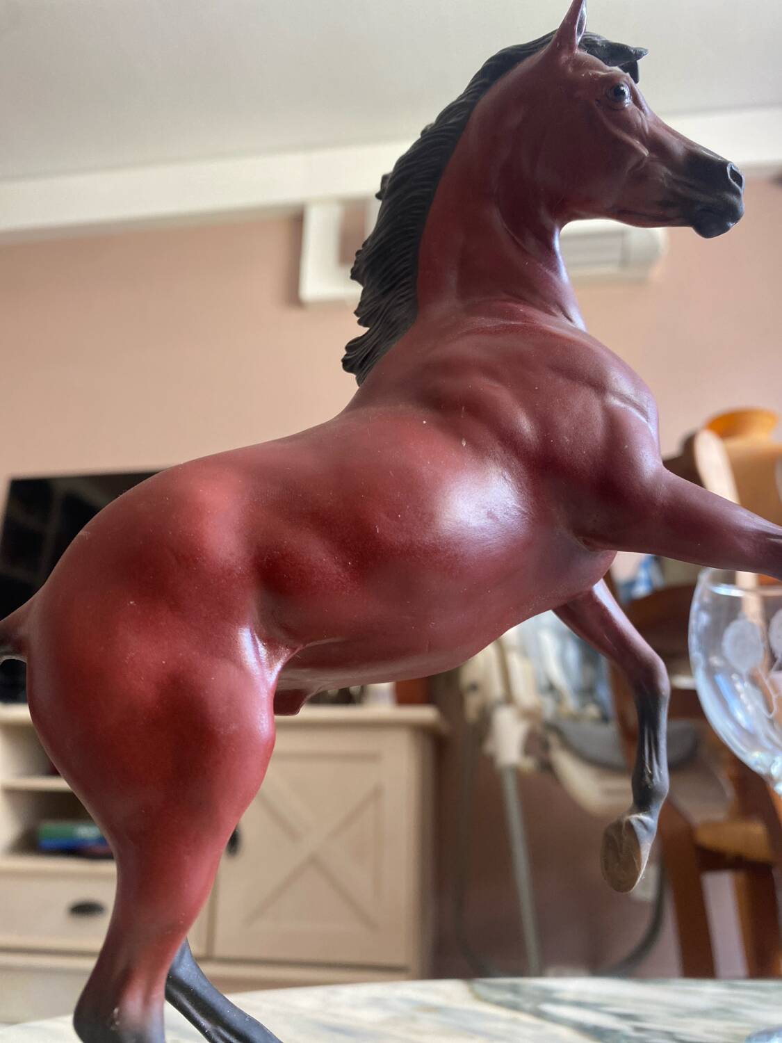 Porcelain horse statue (the red pony)