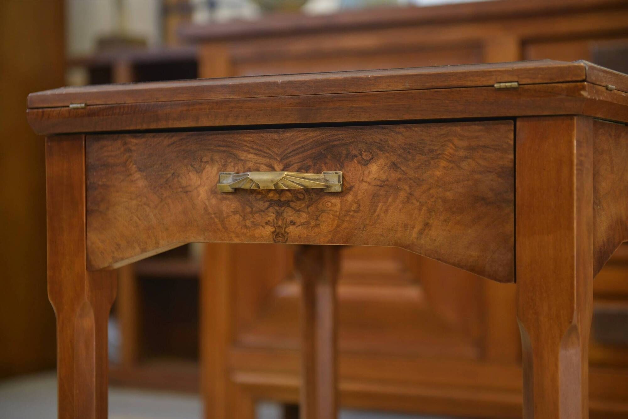 Art Deco game table in walnut from the 1930s.