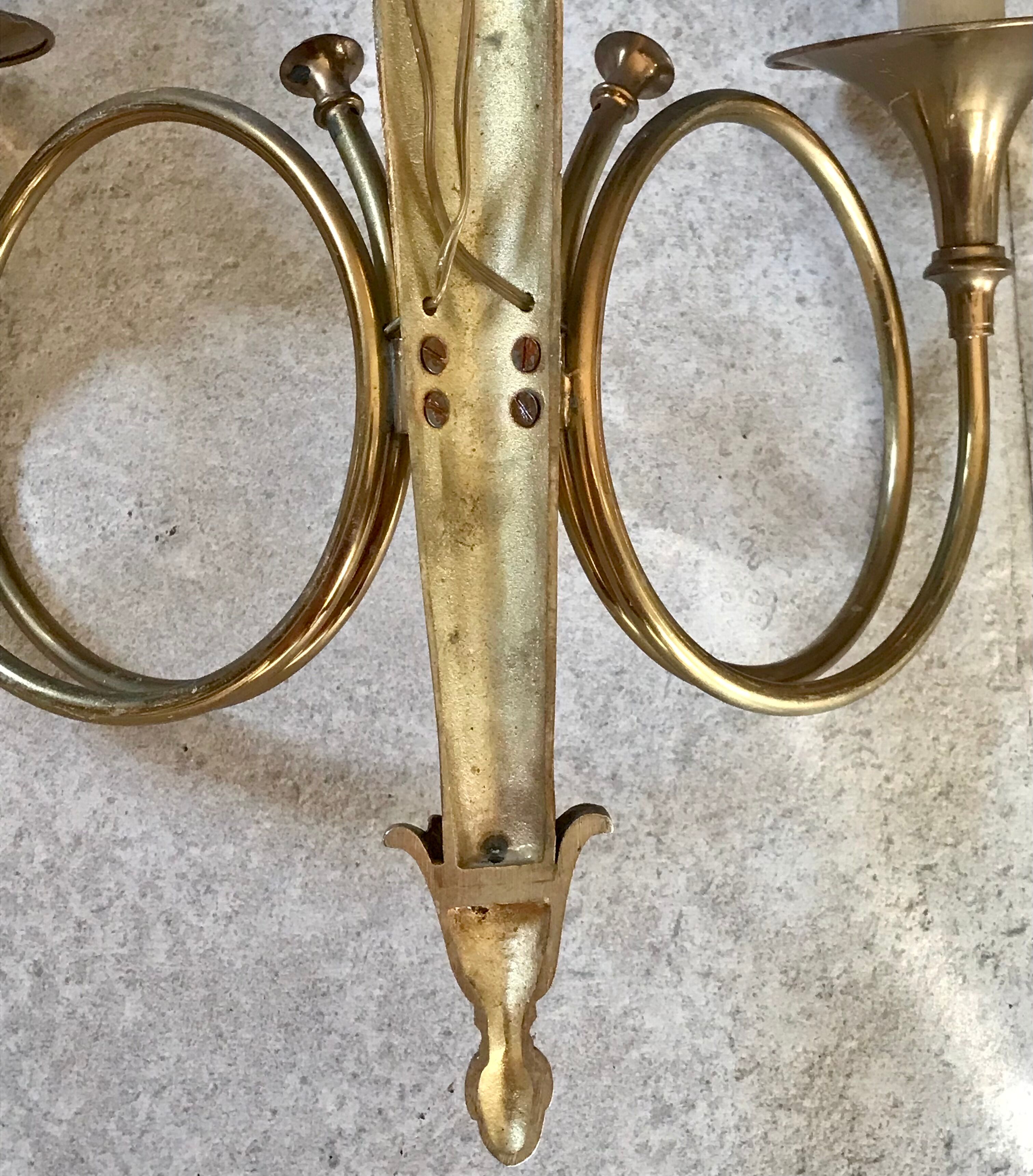 Pair of gilded bronze wall lamps